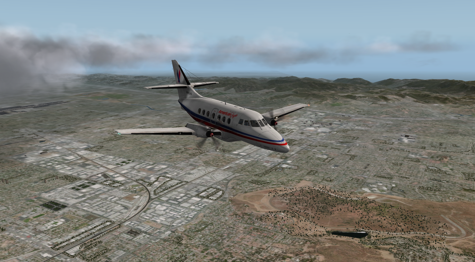 Just past a somewhat cloudy Van Nuys with LAX in the distance