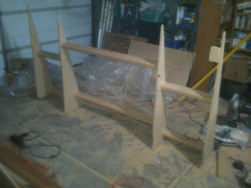 This odd-looking device is the mounting bracket for the projector screen.  Designed to angle the screen to match the projector.  If you do not get the projector perpendicular to the screen, then you will never get the entire screen into focus at the same time.  This took about an hour or two to build and mount.