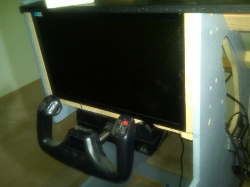 Mounting the yoke and left side monitor.  I am stepping up from a smaller monitor to a pair of 20&quot; displays.  The difference was so staggering that I have to go back and recut all of the instrument panels because the instruments are huuuuge now.  I can actually fit all of the instruments for a B200 on each of these screens without truncating anything.